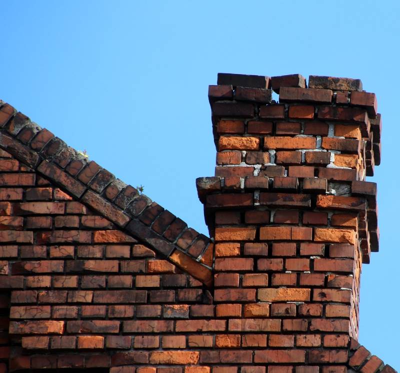 Signs Your Desoto Home Needs a Chimney Inspection Damaged chimney on an Desoto home showing cracks and missing mortar